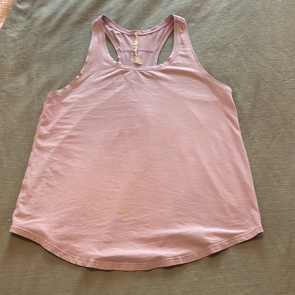 A size 8 Lululemon purple tank top